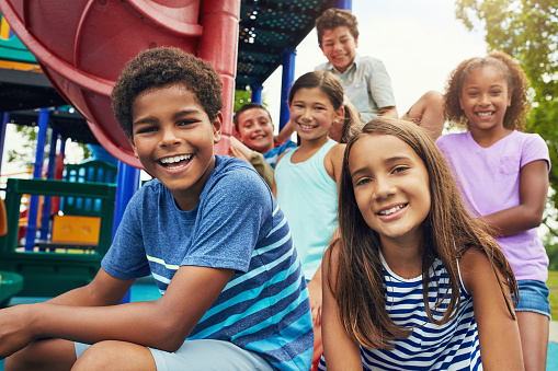  A smiling group of children from Grins & Giggles Family Dentistry in Spokane Valley, WA