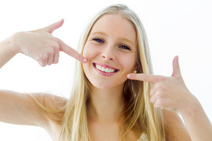 Blond woman with white teeth